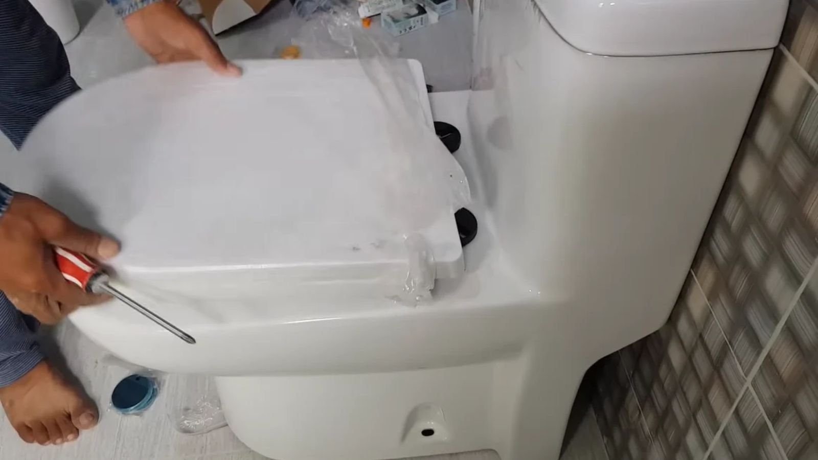 Toilet installation in a Naples, FL bathroom